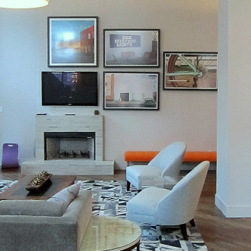 Oversize photo gallery wall with TV